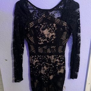 Emerald sundae. Black long sleeve sheer cocktail dress